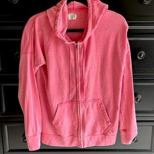 Long sleeve women’s hooded sweater . VOLCOM size Medium.